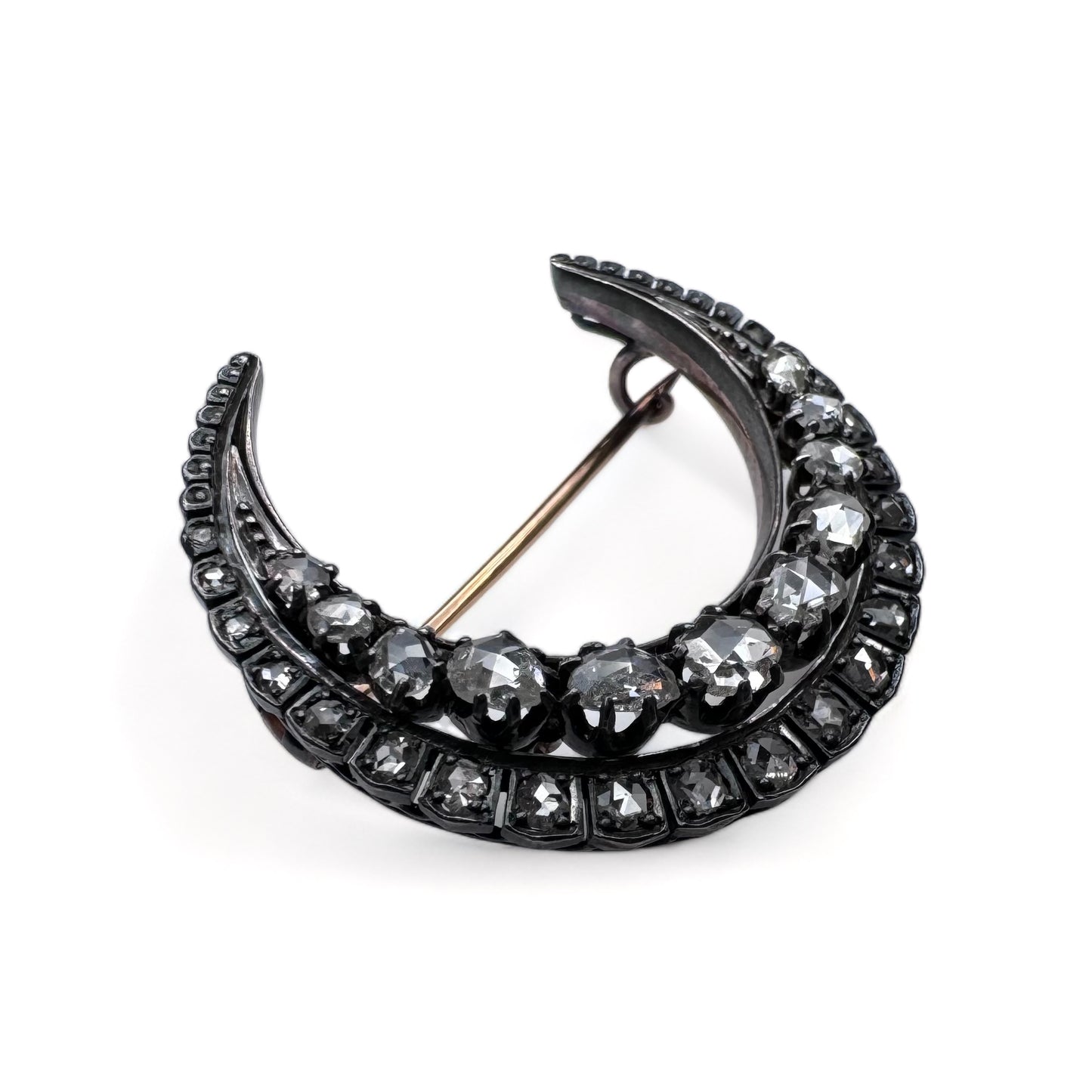 Broche « Croissant » en or et argent sertie de diamants.