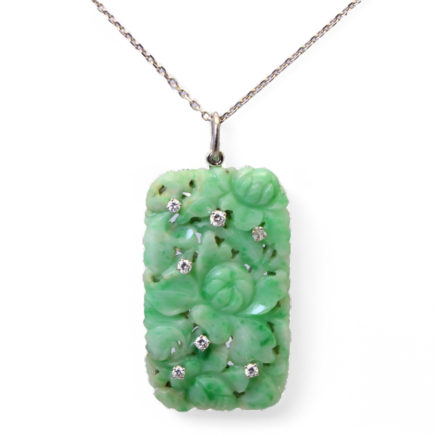 Pendentif Art Déco en or, jade sculpté et diamants.