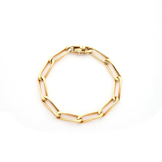 CARTIER Bracelet gourmette en or jaune.