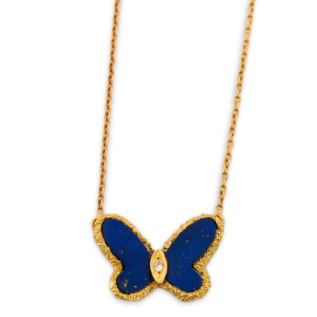 VAN CLEEF & ARPELS Pendentif papillon en lapis-lazuli.