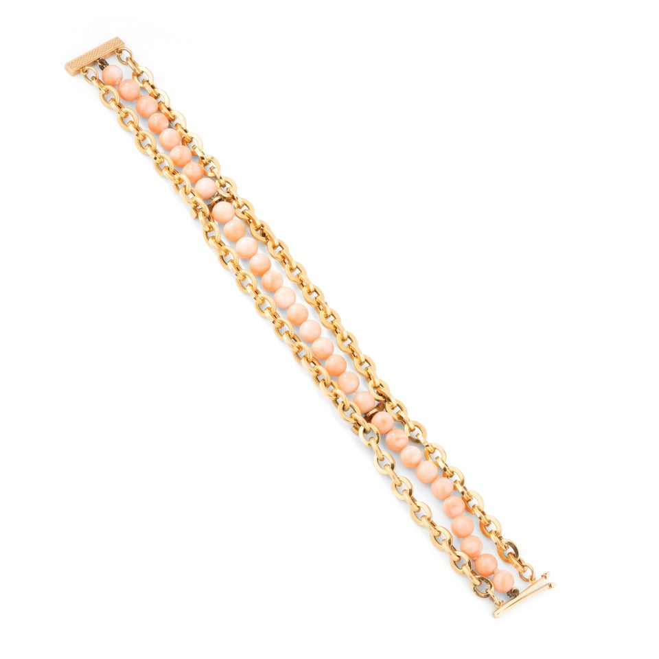 Bracelet en or et corail peau d'ange.
