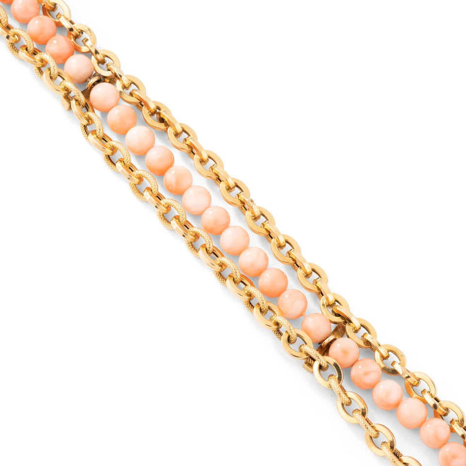 Bracelet en or et corail peau d'ange.