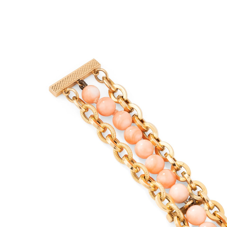 Bracelet en or et corail peau d'ange.