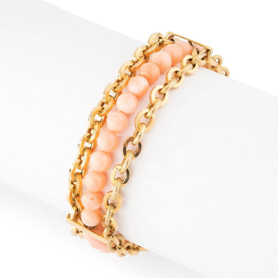 Bracelet en or et corail peau d'ange.